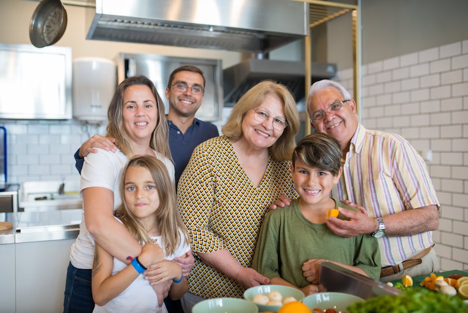 Multigenerational family cooking together in kitchen