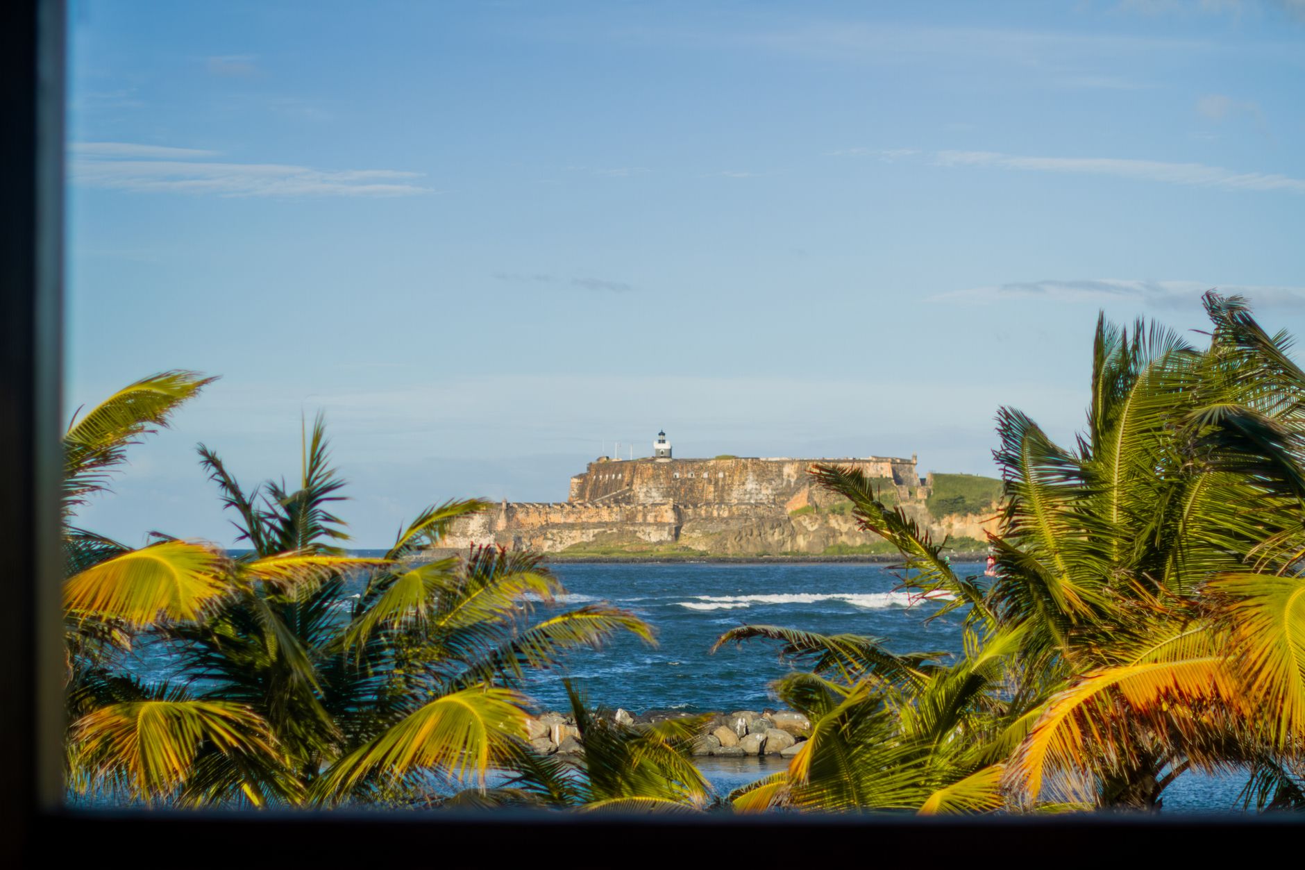 El Morro fortress framed by palm trees in Old San Juan Puerto Rico, a no-passport family trip for US citizens
