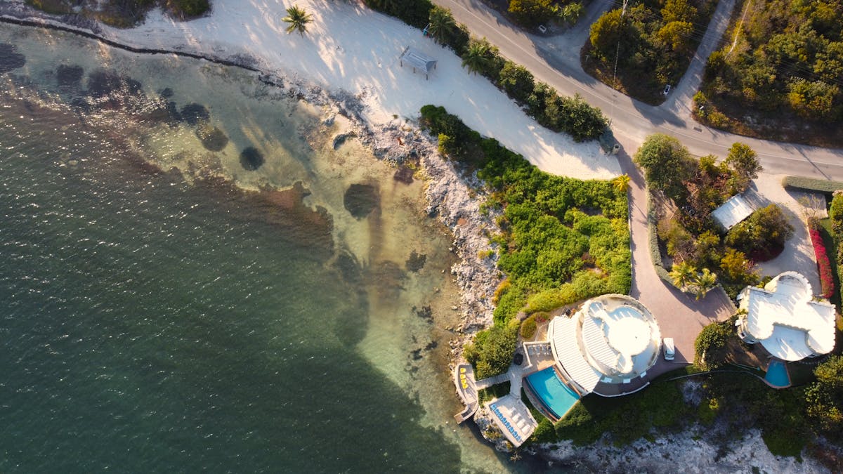 Luxury Caribbean villa rental with private pool overlooking crystal clear turquoise ocean