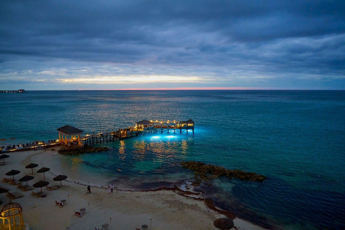 Twilight over a Nassau Bahamas pier, the quieter side of a Paradise Island evening
