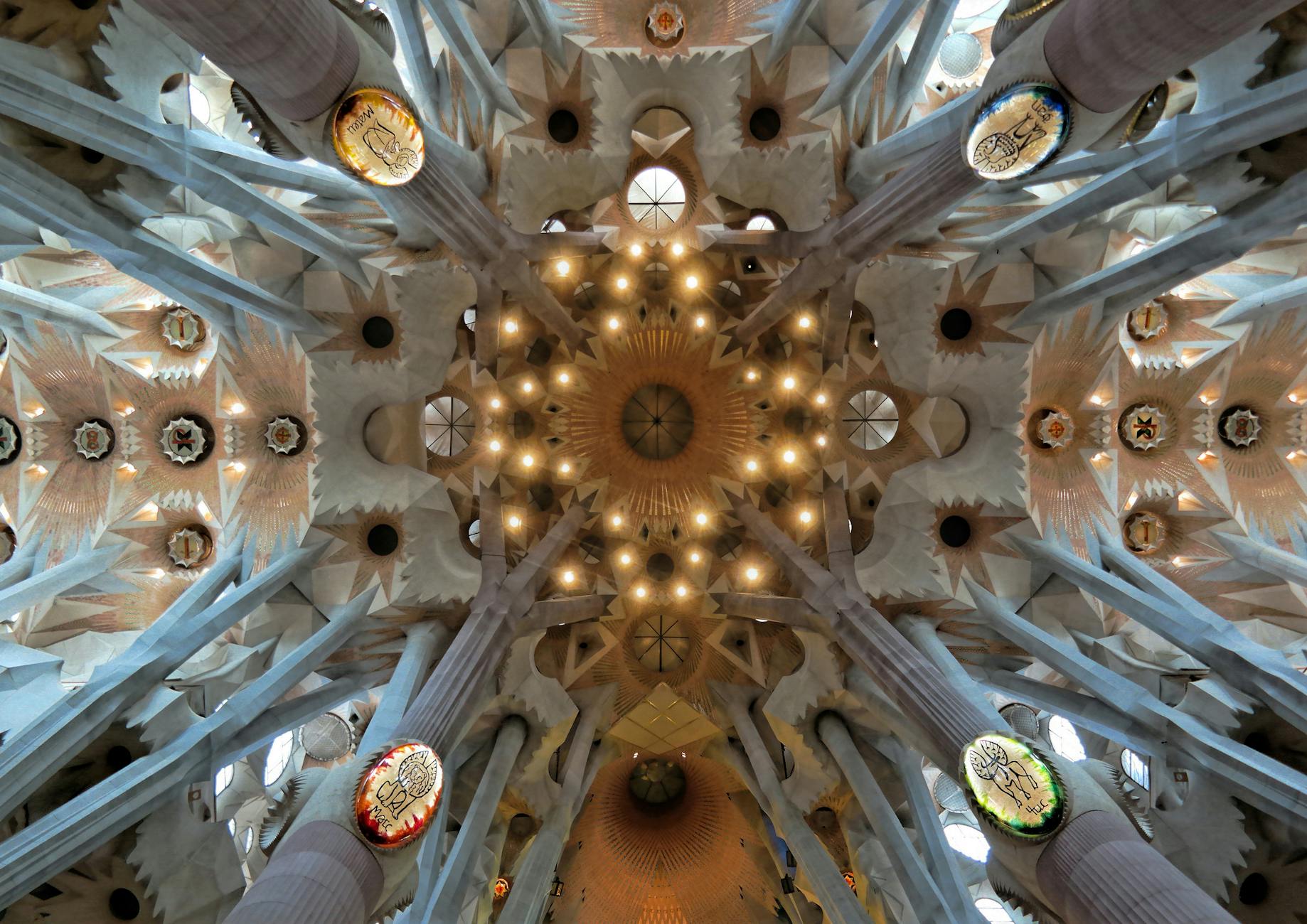 Intricate Art Nouveau ceiling details inside the Sagrada Familia basilica in Barcelona