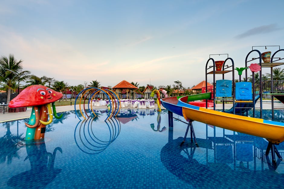 Kids in a resort pool, the supervised-hours question that decides whether a luxury week actually works.