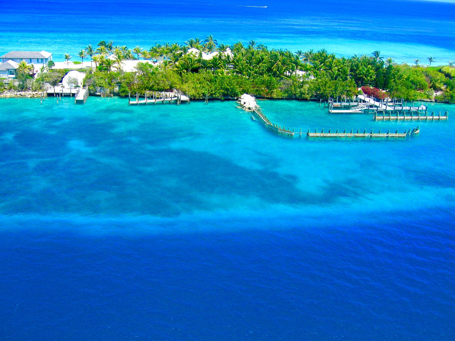 Aerial view of Nassau Bahamas coastline and blue water near the Cable Beach and Paradise Island family resorts