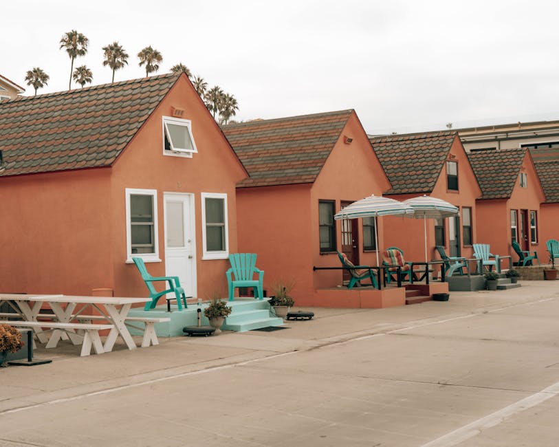Charming budget-friendly beach cabins with palm trees at a coastal vacation spot