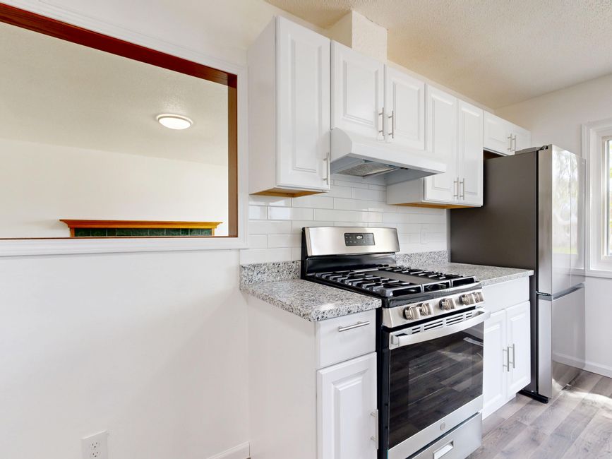 Full in-suite kitchen with a stove and refrigerator, the extended-stay feature that makes a hotel brand work for families