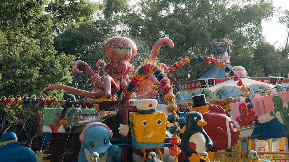 Colorful octopus-themed amusement park ride in a family theme park setting