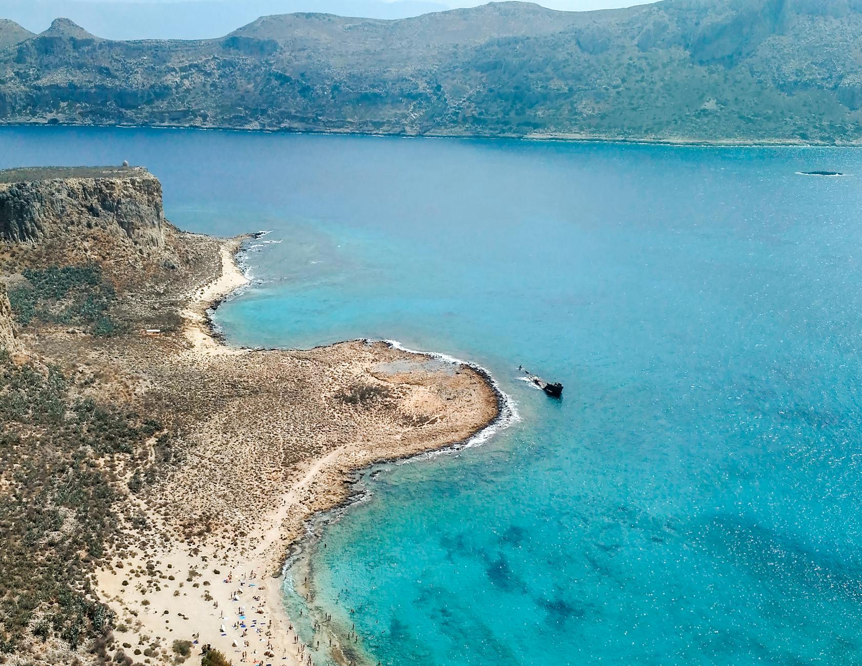 Aerial view of Balos Beach in Crete with turquoise shallow water and rugged coastline