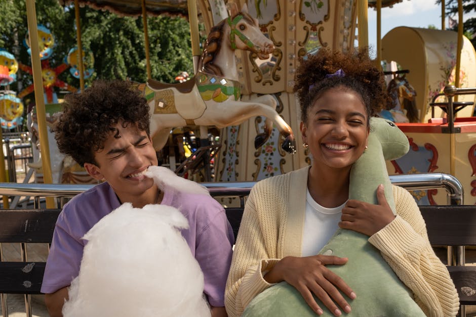 A cheerful moment at the amusement park with friends enjoying cotton candy and plush toys