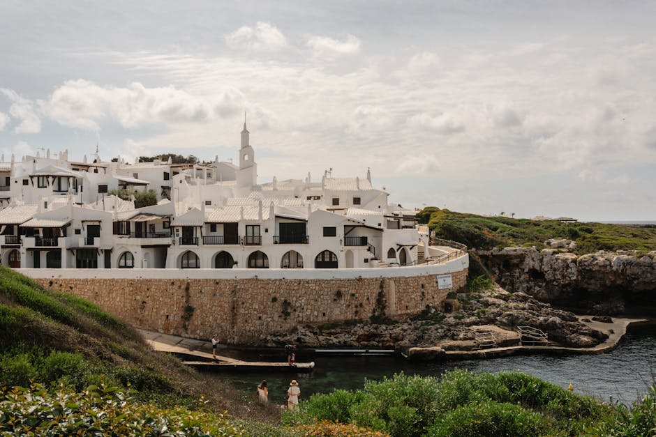 Mediterranean coastal town on Spain's Costa Blanca with pastel houses and fishing boats