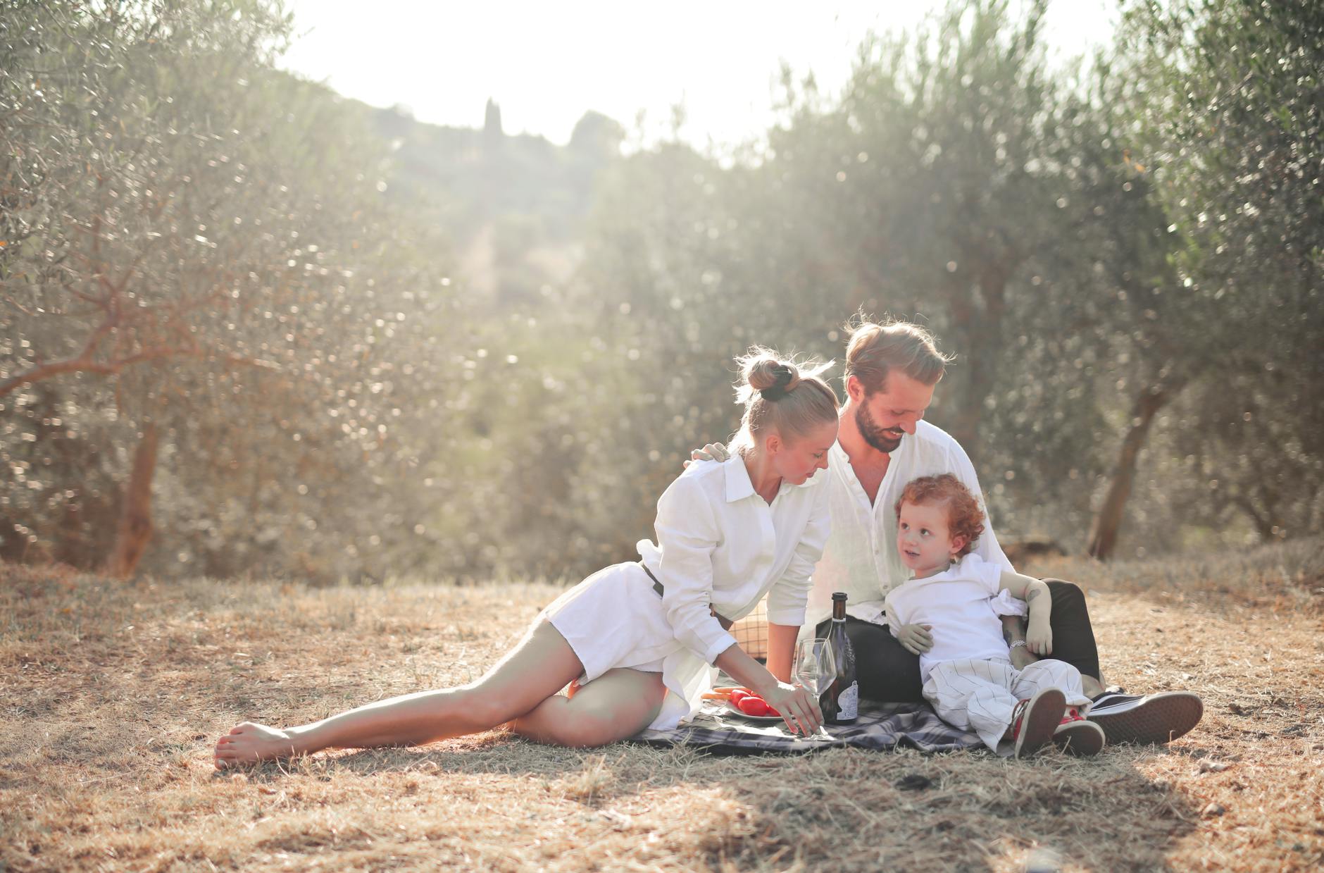 Family enjoying an outdoor rest stop break during a road trip