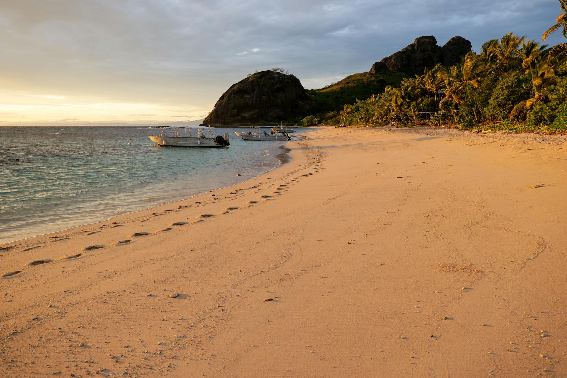 Golden Fiji sunset on Yasawa Islands beach, a Fiji family resorts south Pacific scene