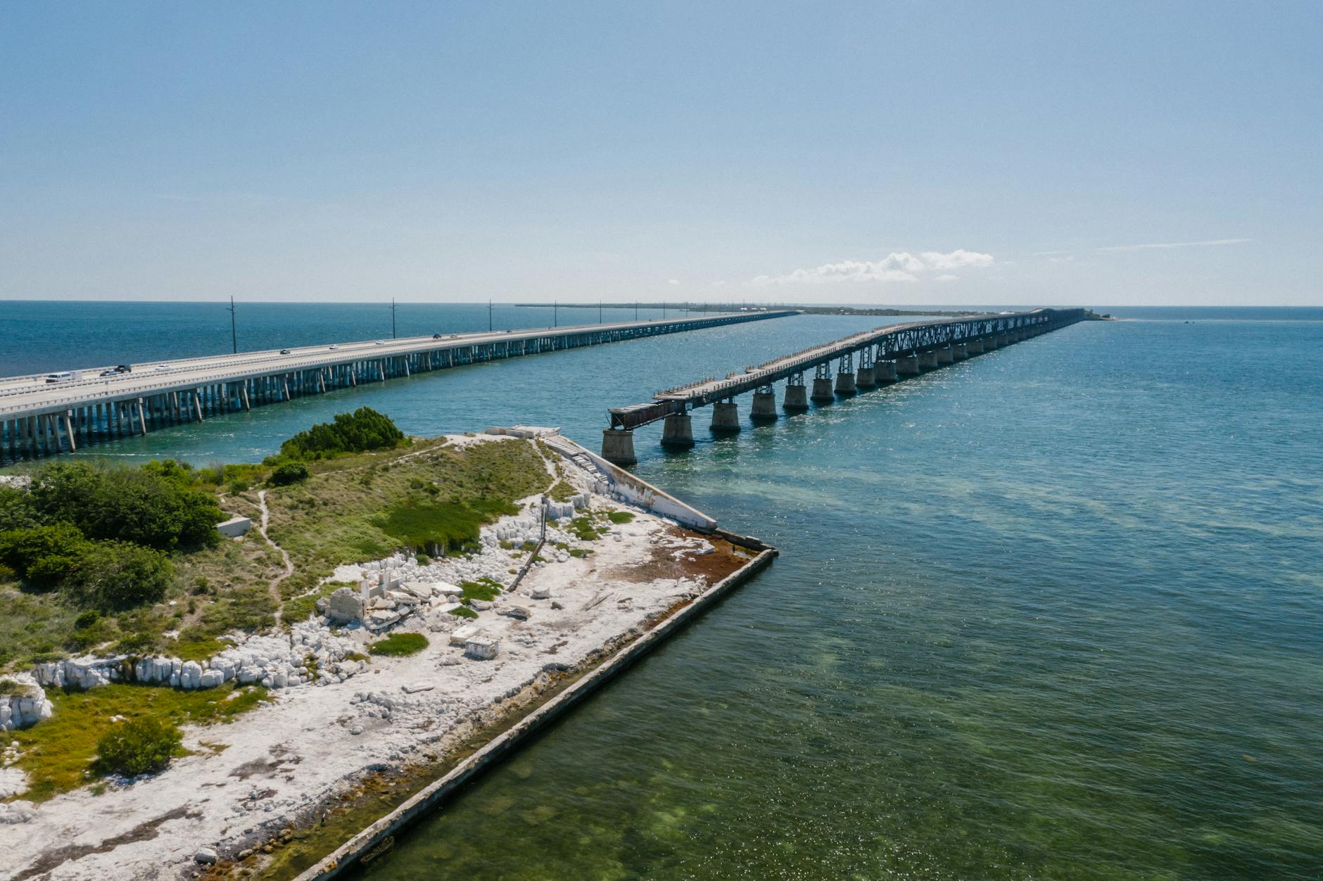 Aerial view of Seven Mile Bridge stretching across clear blue Florida Keys water
