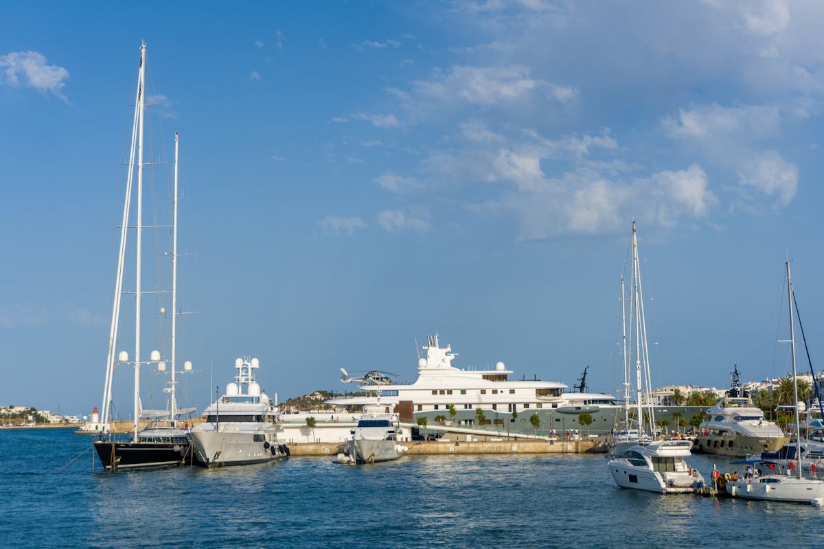 Yachts docked in Fort Lauderdale marina with city skyline