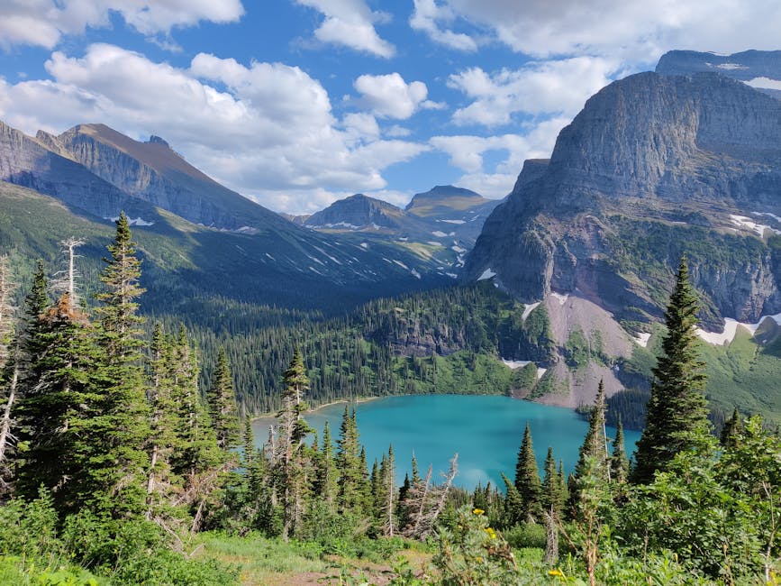 Mountain lake surrounded by forest in Glacier National Park Montana
