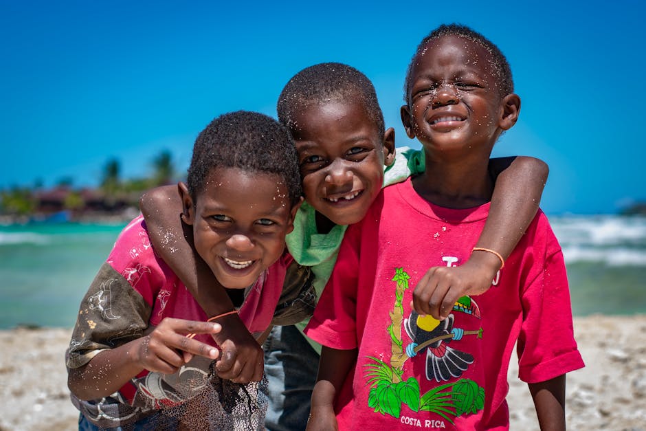 Children playing together on a sunny tropical beach