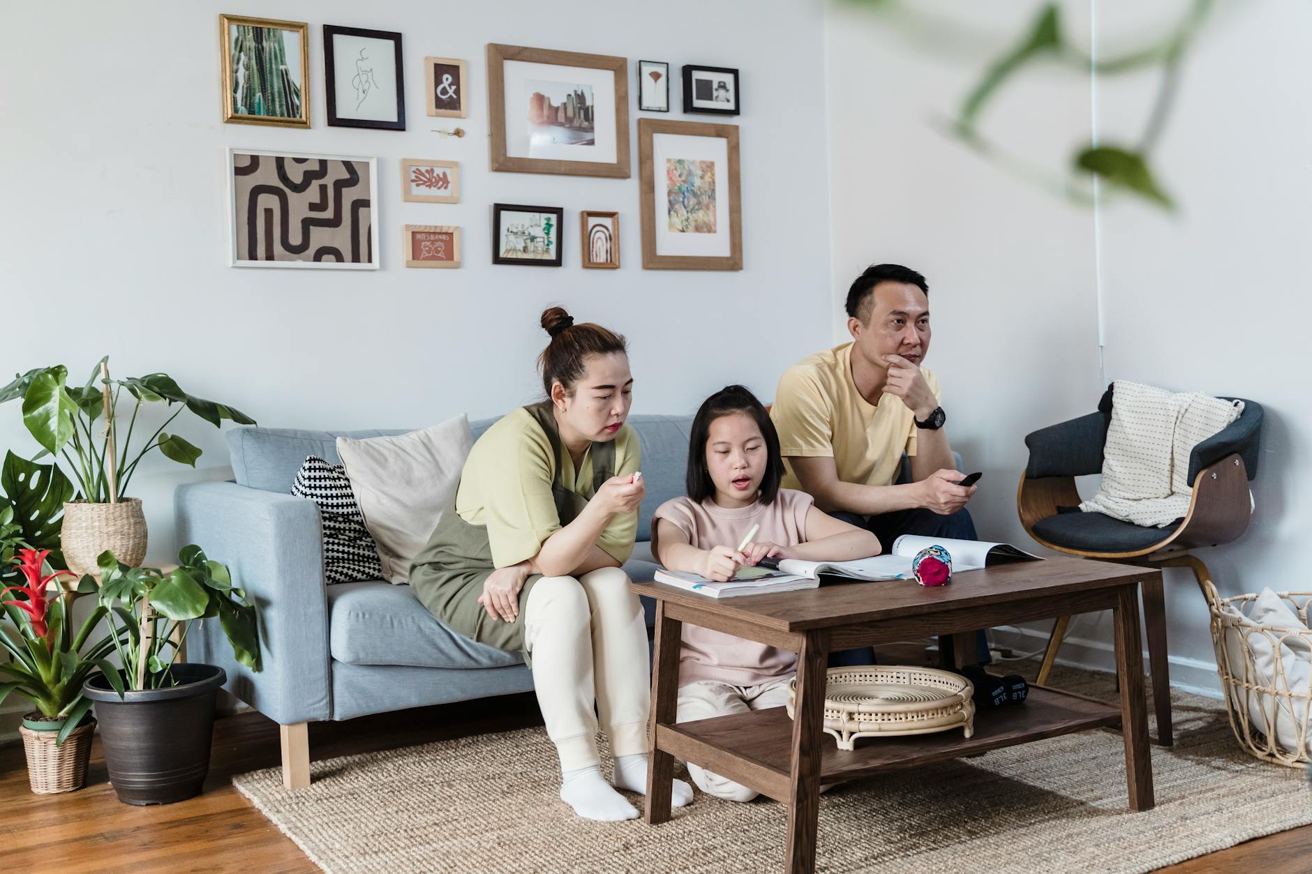 Family relaxing together in a vacation rental living room