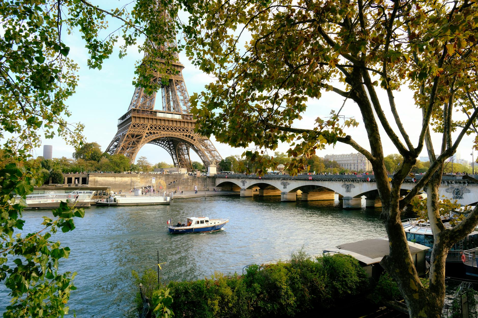 Seine River view with Eiffel Tower and Paris bridges on a clear day