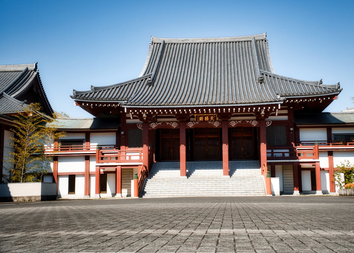 A traditional temple in Tokyo surrounded by gardens, one of many cultural attractions families enjoy in Japan