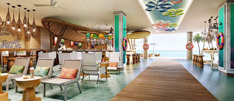 Bikini Bottom themed beach lounge at Nickelodeon Riviera Maya &mdash; SpongeBob-inspired decor, jellyfish ceiling lights, ocean view from the loungers