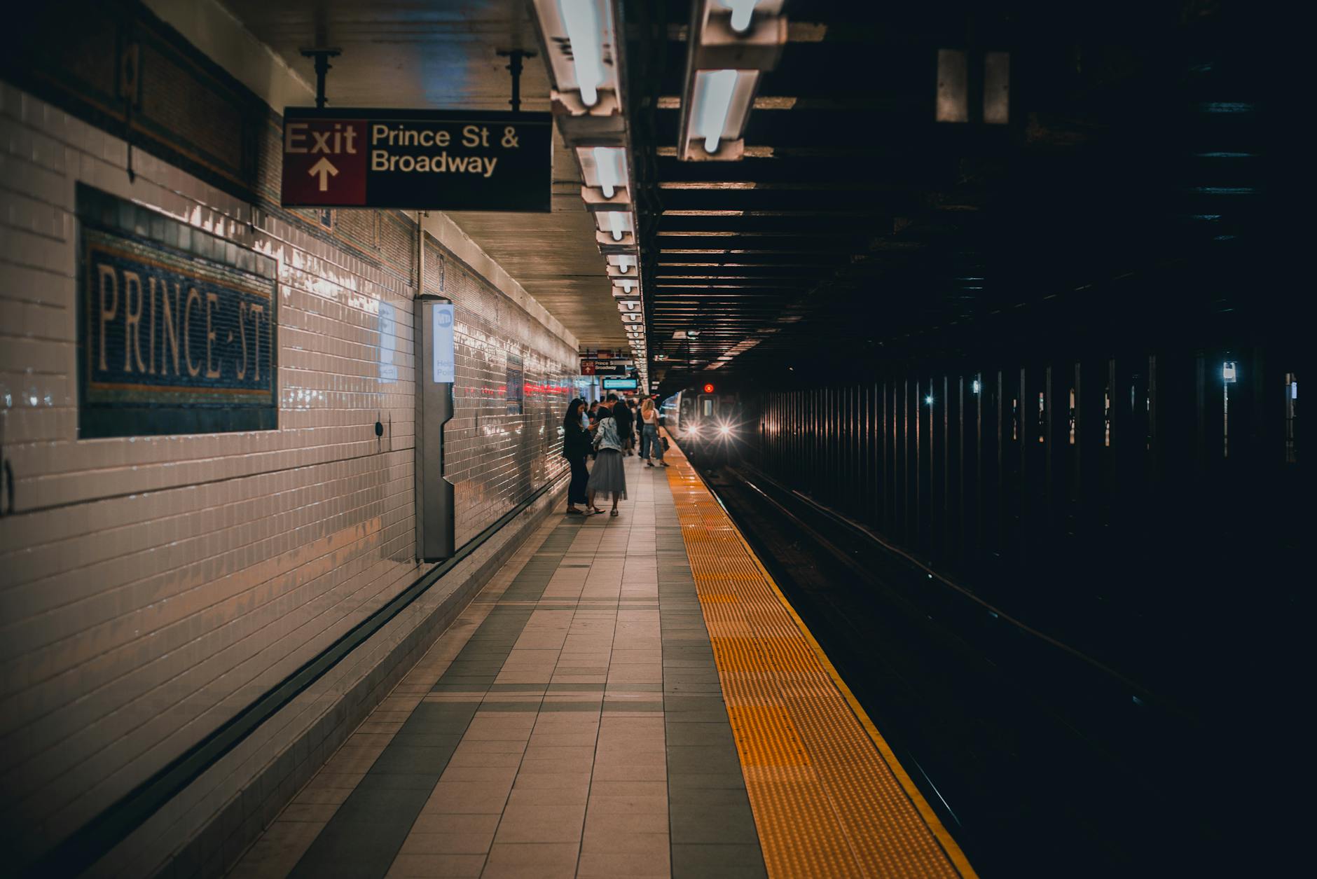People waiting at a New York City subway platform