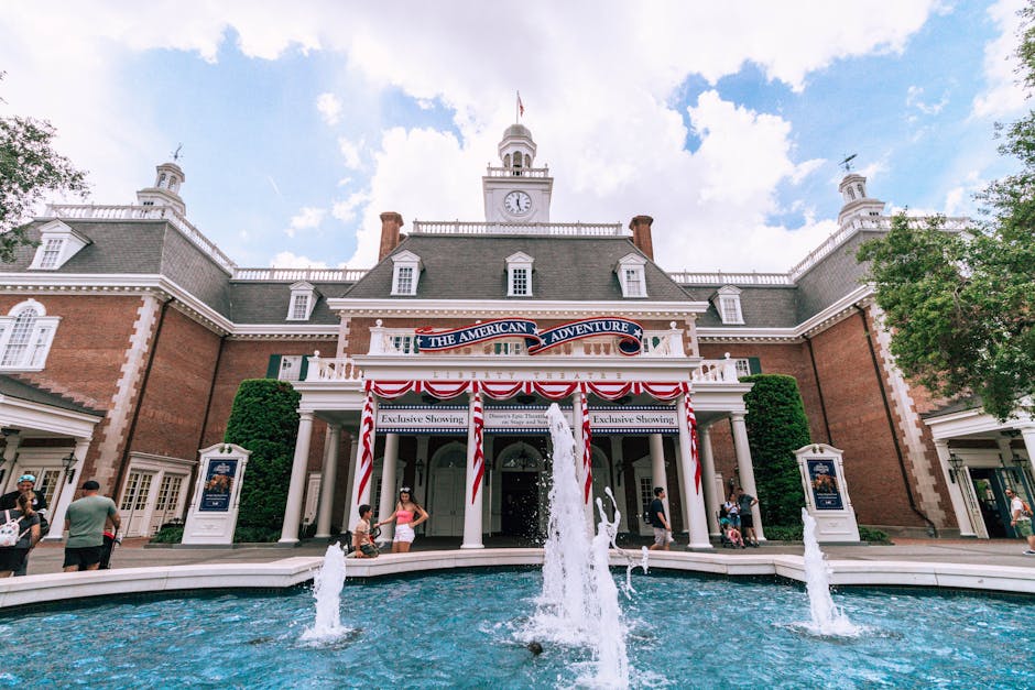 The American Adventure pavilion at EPCOT with a fountain in front at Walt Disney World