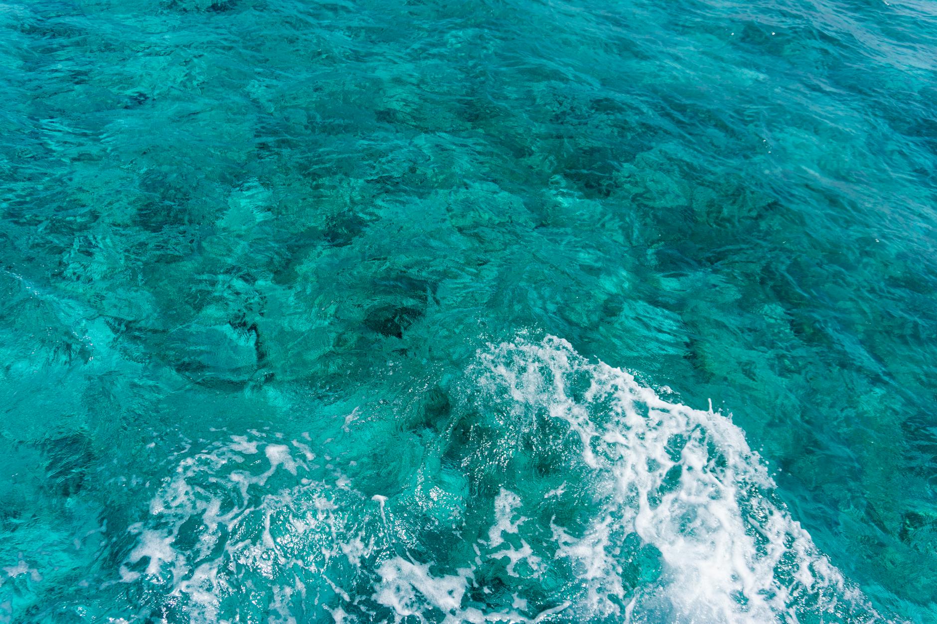 Clear turquoise Caribbean water over coral reef for snorkeling