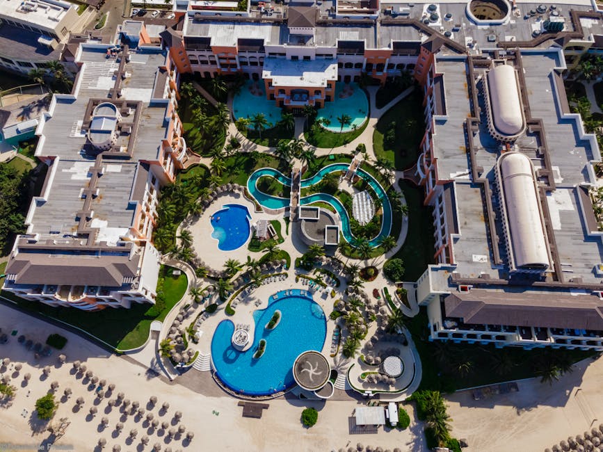 Aerial view of a Caribbean beach resort with turquoise water
