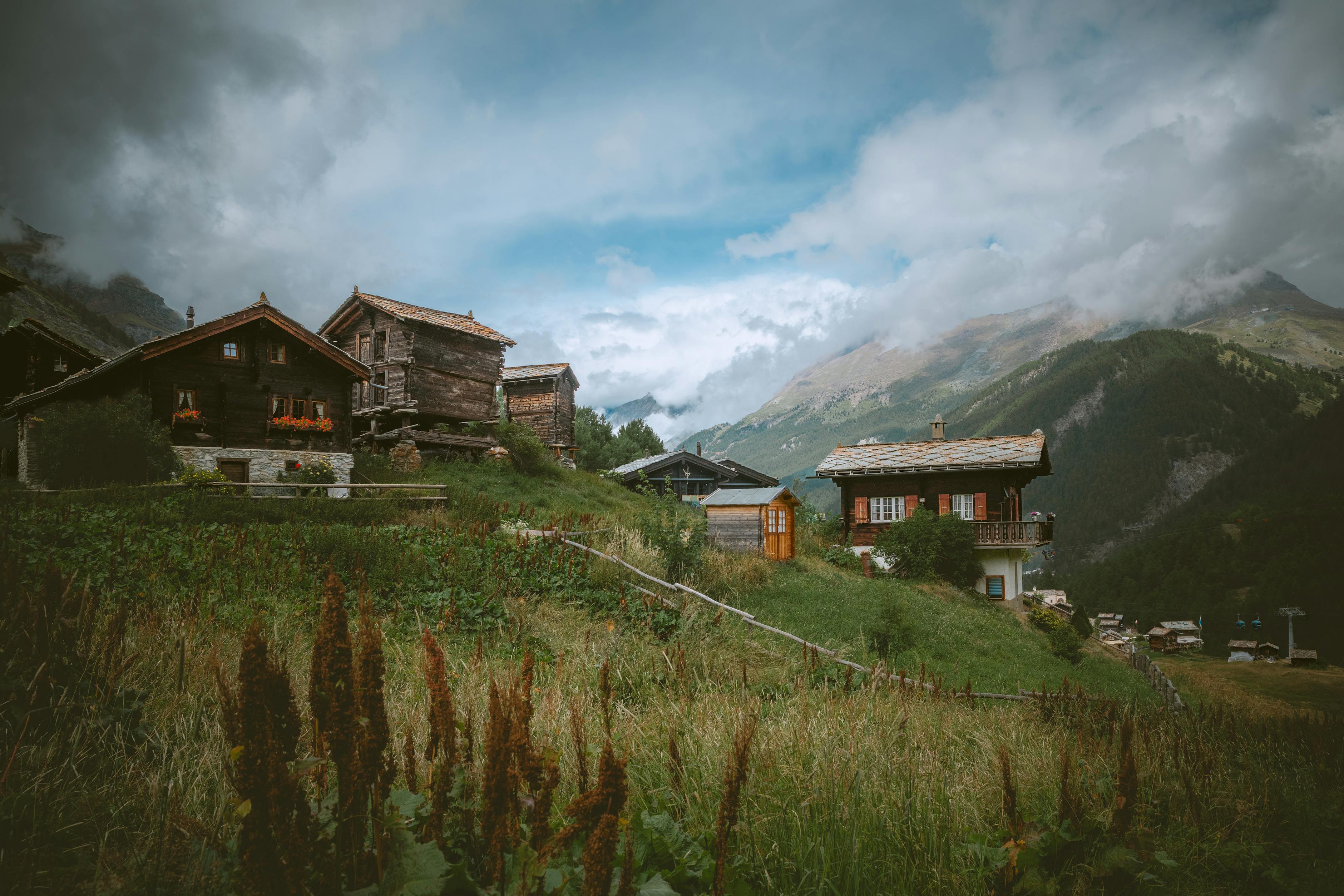 Traditional Swiss chalets in Zermatt with the Matterhorn in the distance &mdash; the iconic alpine village base for families willing to pay the premium
