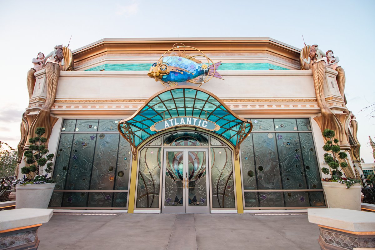 Atlantic restaurant facade in Celestial Park at Epic Universe, the hub land families cross between the portals