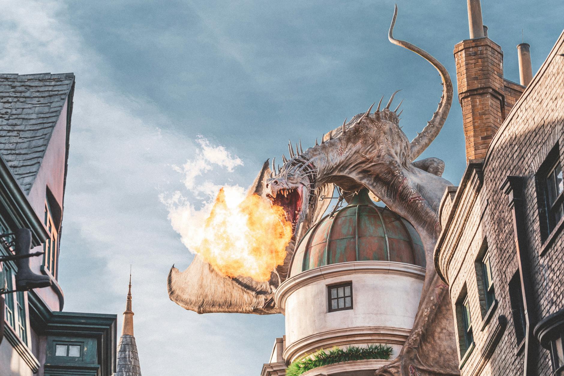 Fire-breathing dragon sculpture perched above Diagon Alley at Universal Studios Orlando