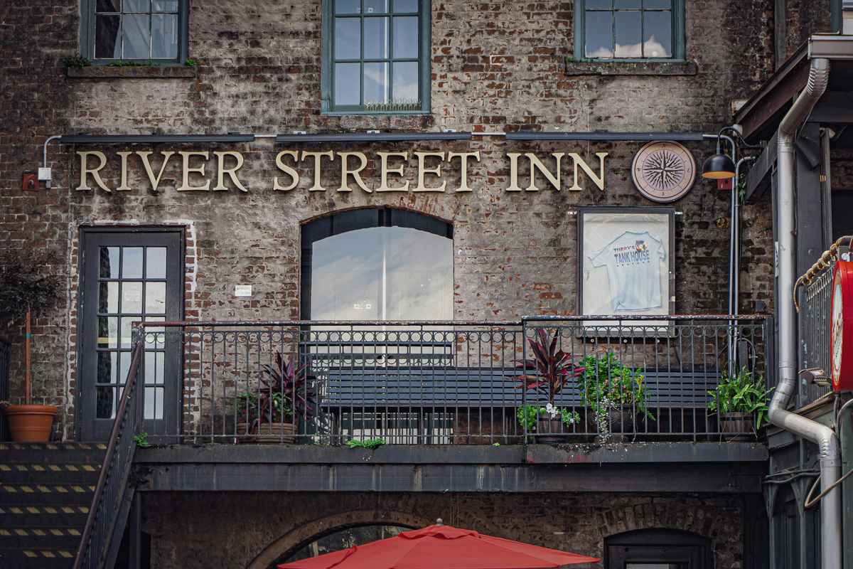 Old Faithful Inn at night under starry sky - iconic Yellowstone in-park lodge accommodation